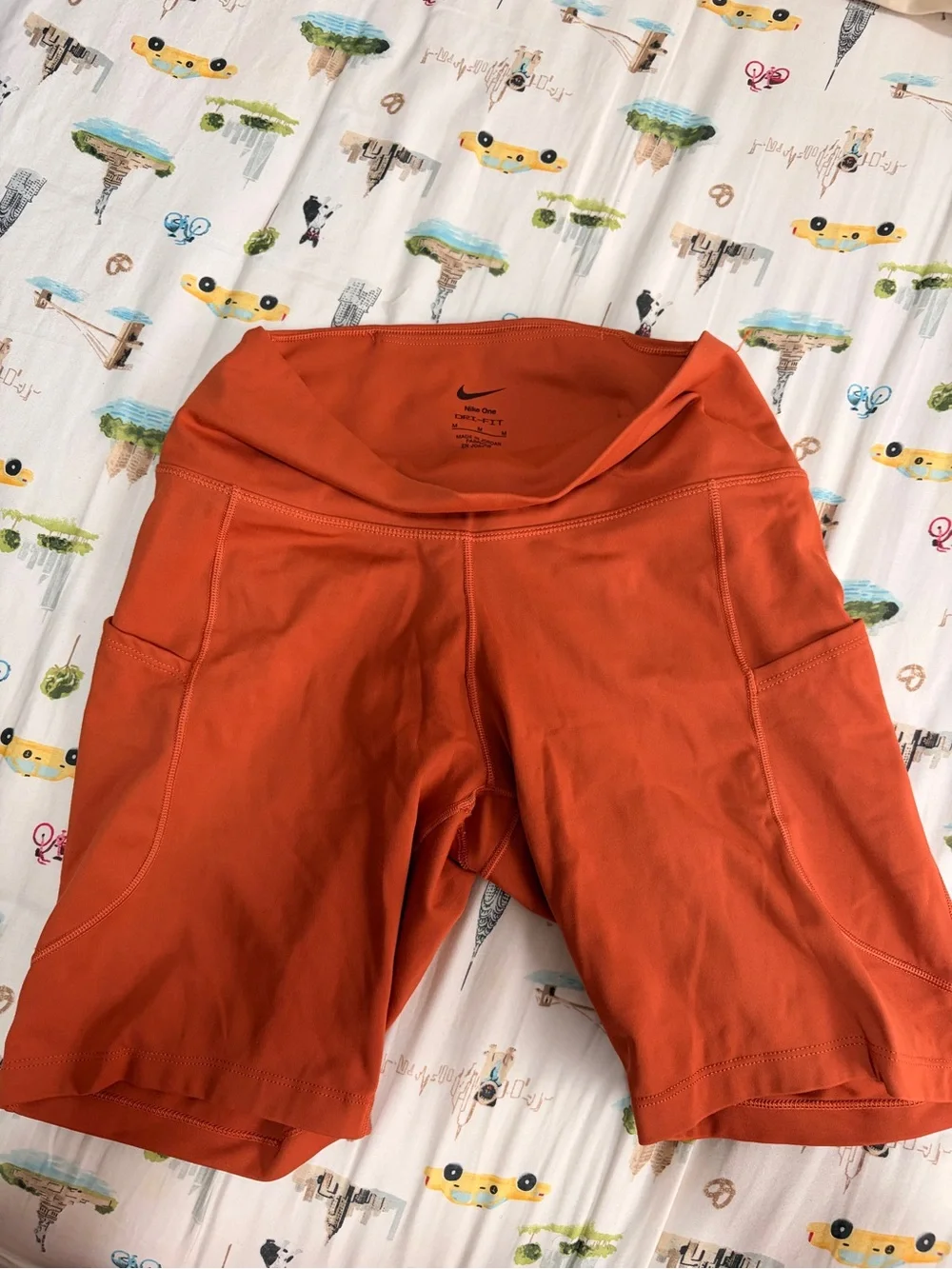 Nike Orange High-Rise Bike Shorts with Side Pockets